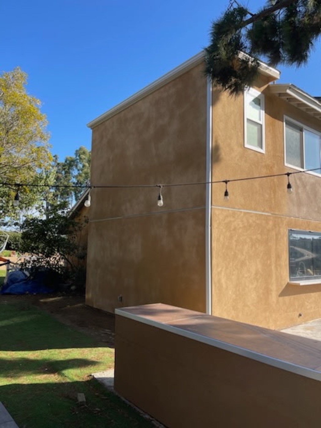 Completed two-story ADU with stucco exterior finish