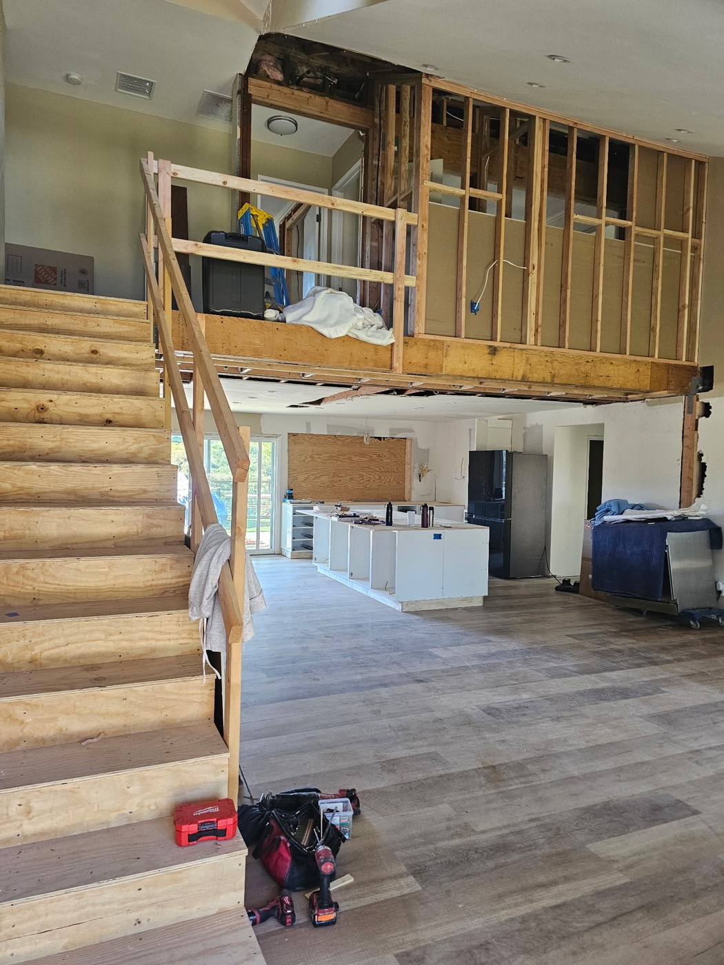 Multi-level home remodel with open staircase and kitchen
