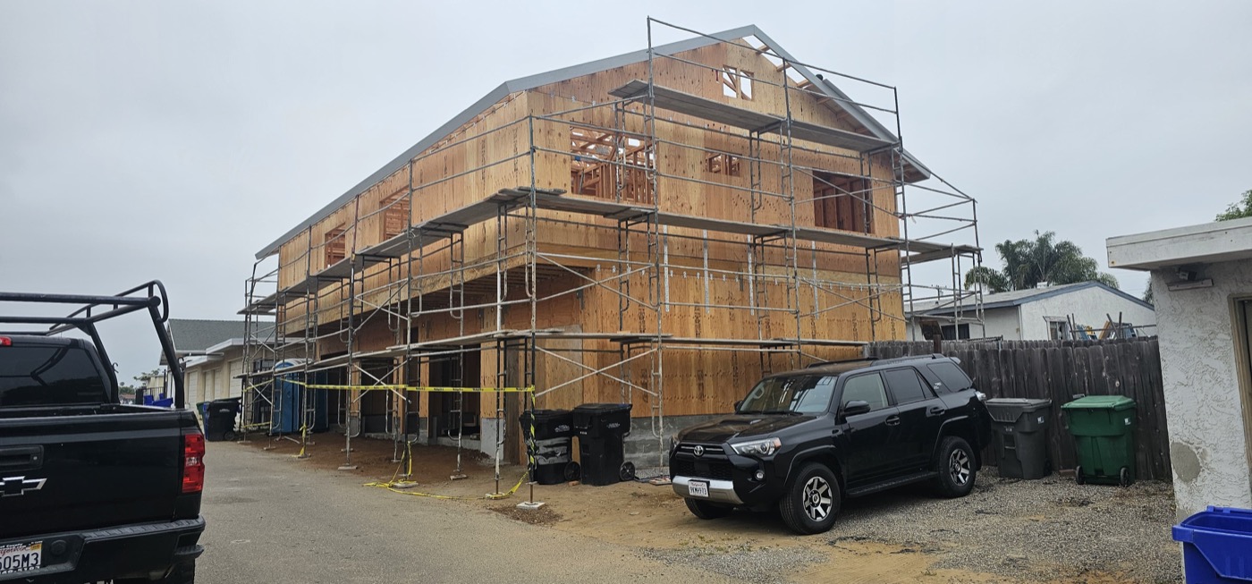 Large two-story new build with full scaffolding