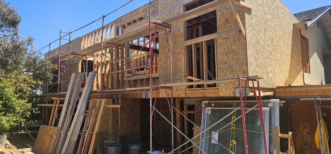 Two-story new build framing with scaffolding