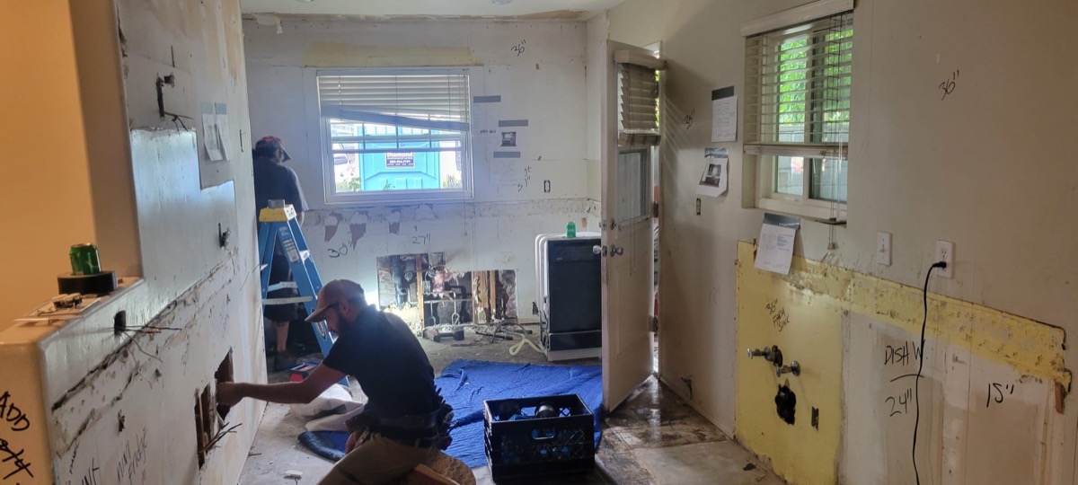 Kitchen stripped to studs during full gut remodel
